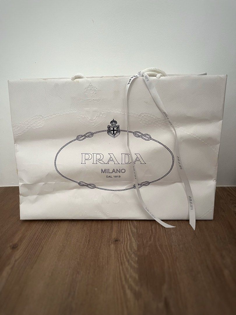 Prada paper bag, Luxury, Bags & Wallets on Carousell