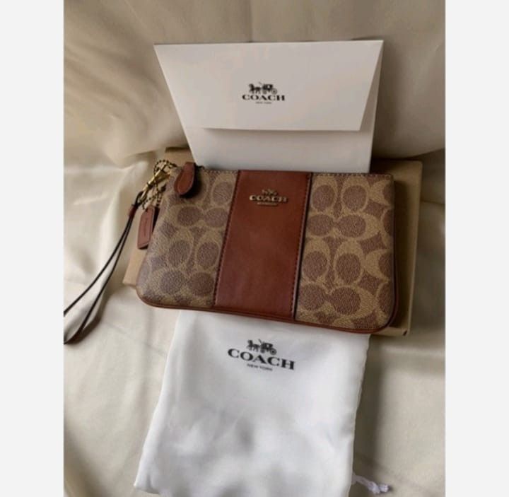 Small wristlet in best sale colorblock signature canvas