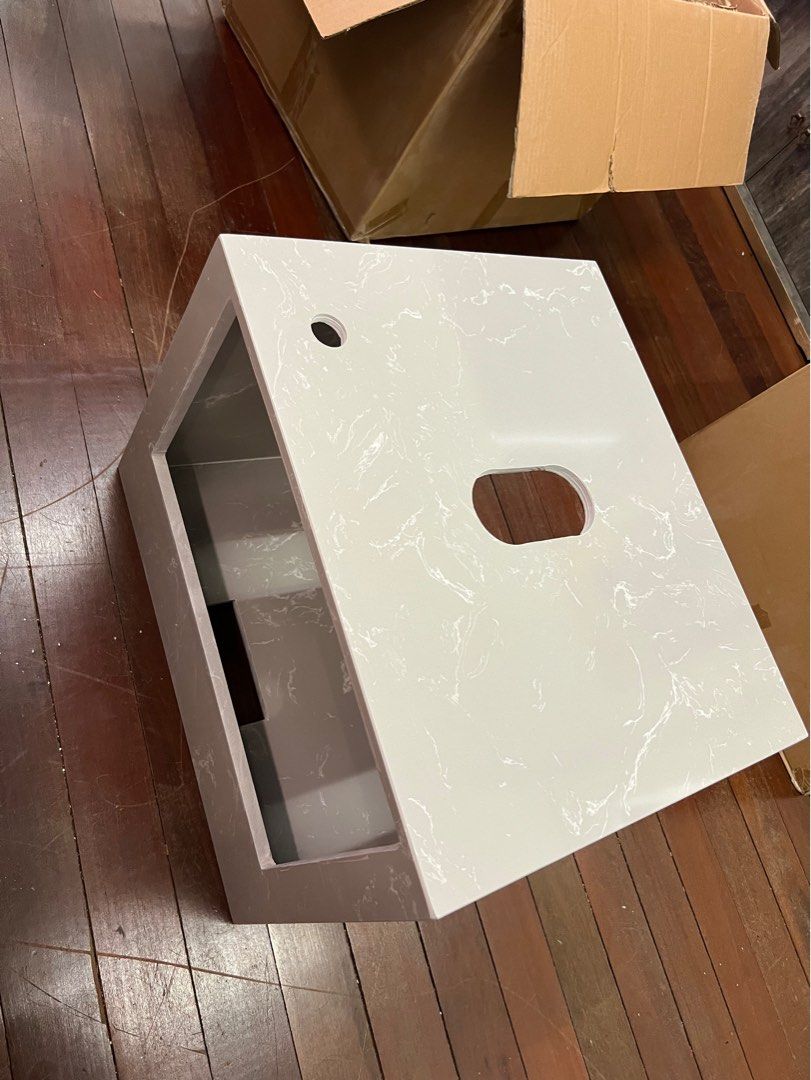 Solid surface bottom vanity (Category: Bathroom & Kitchen Fixtures) located in Singapore. Submitted by yapjianhua (Listing ID 1207267030, Image 1). Description: Brand new Solid surface bottom vanity for sales . 550mm (L) x 450mm (W) .
