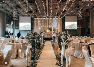 Wedding overhead fairylights walk-in aisle decor