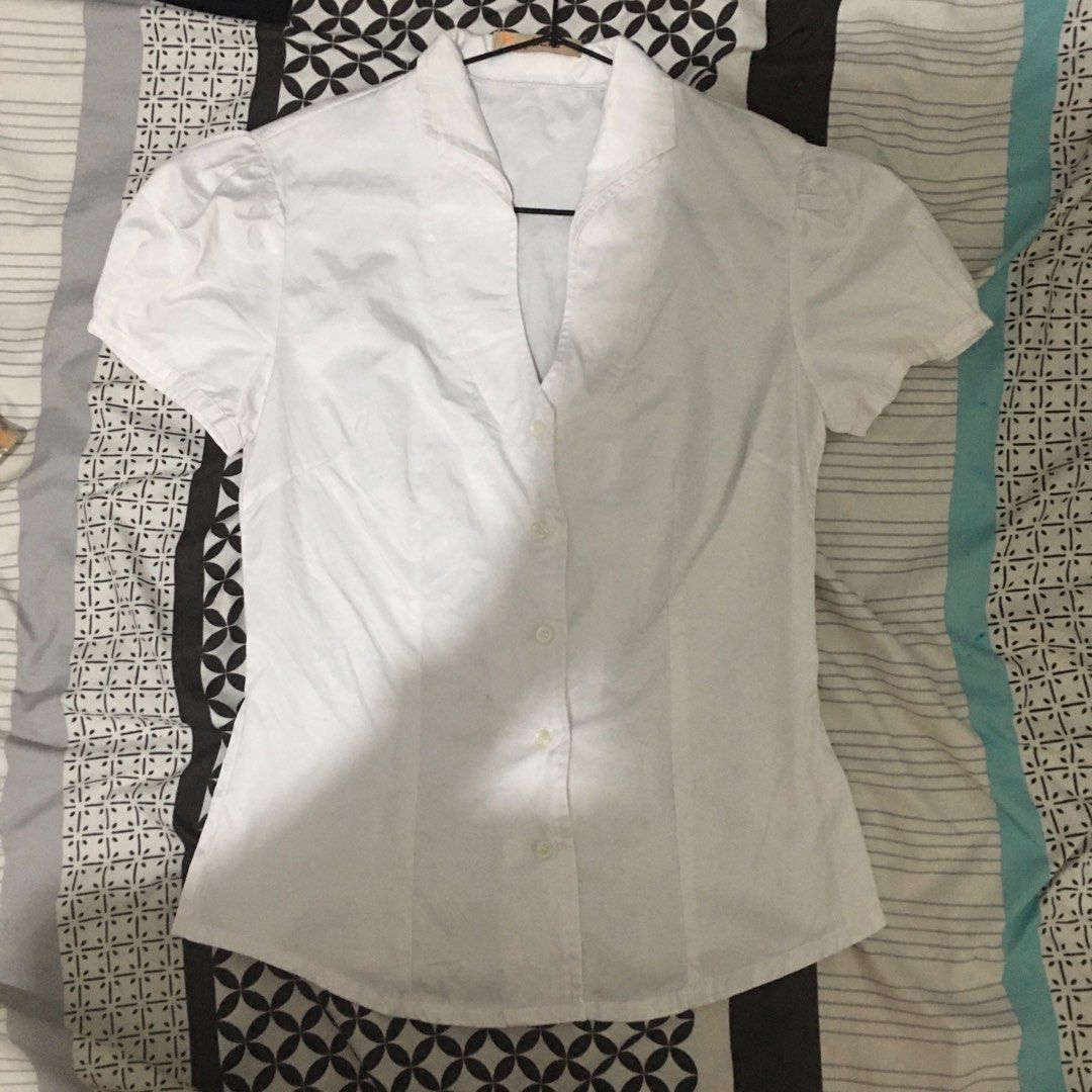 white button down short sleeve blouse (Category: Blouses) located in Taguig. Submitted by jdeclutter__ (Listing ID 1207244681, Image 1). Description: downtown girl vibes .