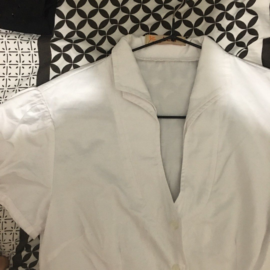 white button down short sleeve blouse (Category: Blouses) located in Taguig. Submitted by jdeclutter__ (Listing ID 1207244681, Image 2). Description: downtown girl vibes .