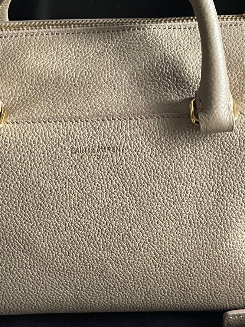 YSL Mini Boston Bag Nude/Beige Two way (Category: Luxury Bags & Wallets) located in Manila. Submitted by VShoppeManila (Listing ID 1207211330, Image 2). Description: 💯 Guaranteed Saint Laurent Authentic item Inclusions : dustbag and entrupy certificate 📝No return, no exchange except when proven fake - money back guaranteed (proof from professional authenticators, such as entrupy, is required) 📝 Set proper expectation for used item but assured 