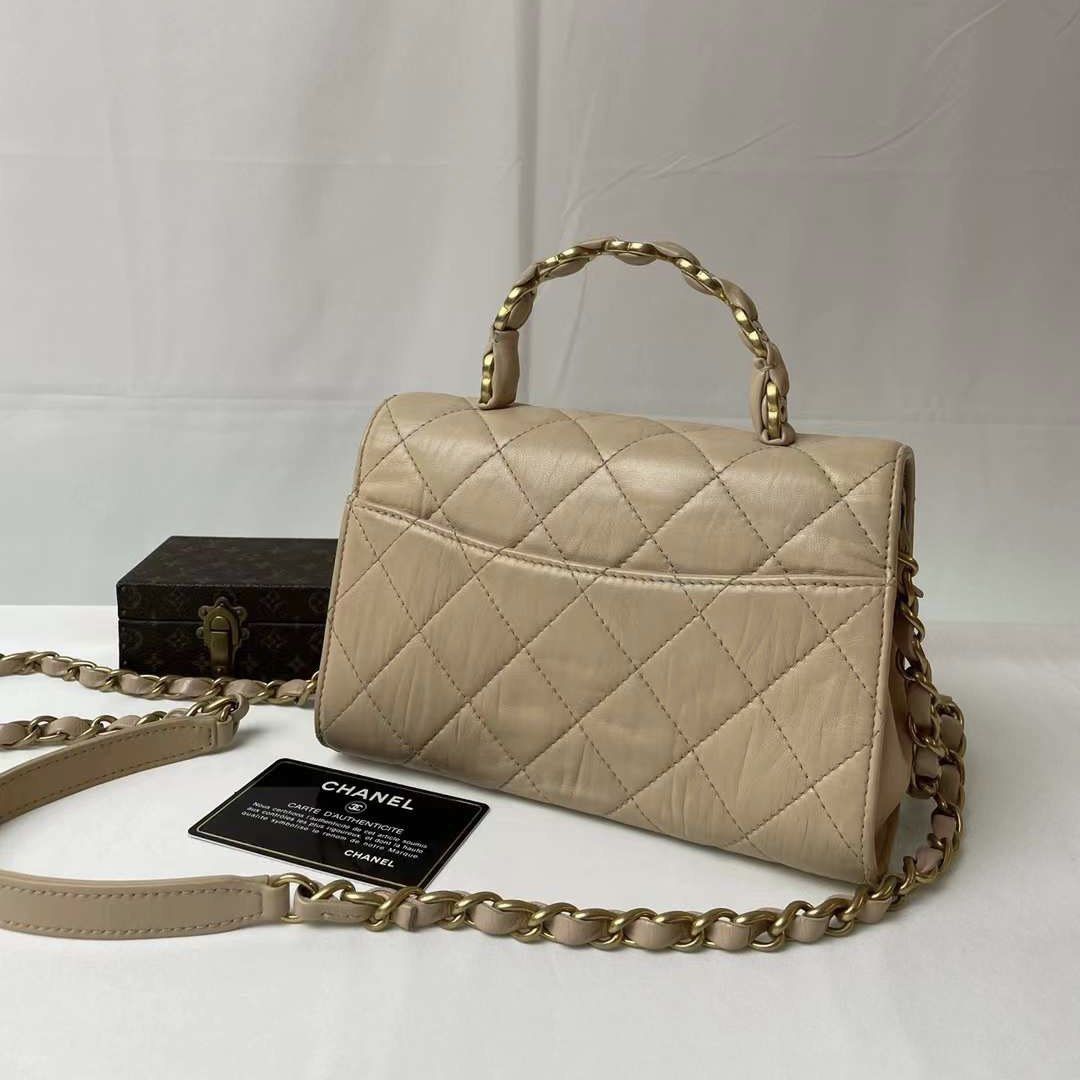 Authentic Chanel Mini Flap Bag with Top Handle Beige Crumpled Lambskin Aged  Gold Hardware, Luxury, Bags & Wallets on Carousell