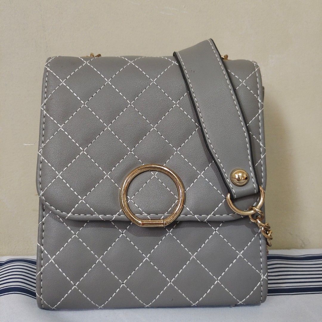 Pre-loved DISSONA Sling Bag, Women's Fashion, Bags & Wallets, Cross-body  Bags on Carousell