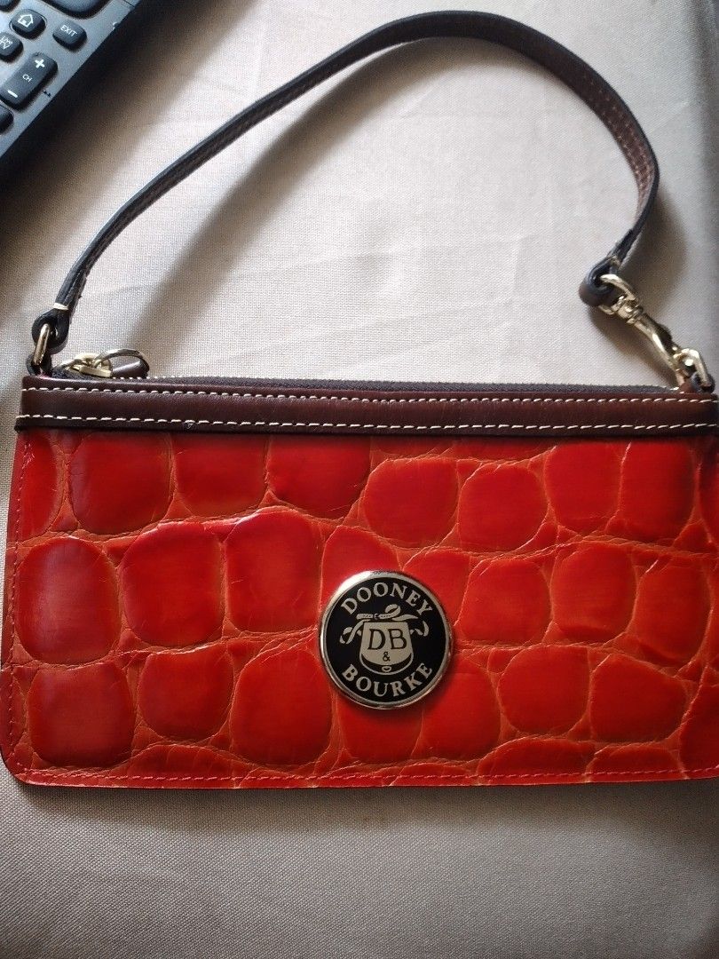Dooney and burke wrislet, Luxury, Bags & Wallets on Carousell