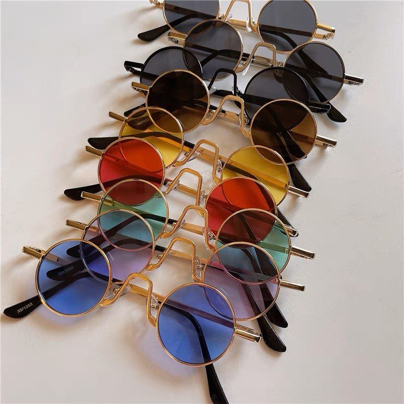 Gold frame black lens sunglasses top