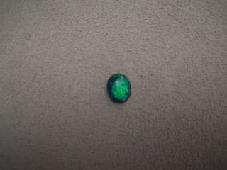 Loose 8x10mm blue green genuine Opal 1.34ct or simply black Opal
