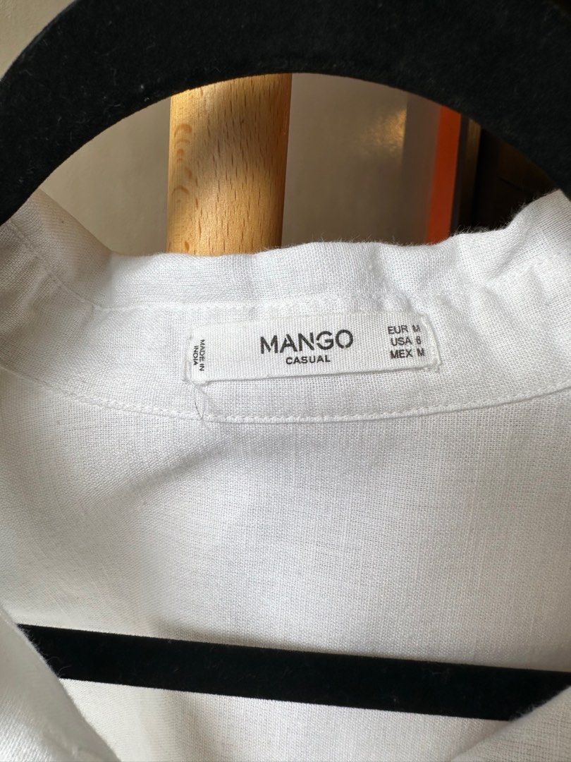 Mango Cotton Top with Flower Embroidery (Category: Sleeveless) located in Manila. Submitted by she.declutters05 (Listing ID 1212279624, Image 2). Description: Fit: Relaxed Color: White .