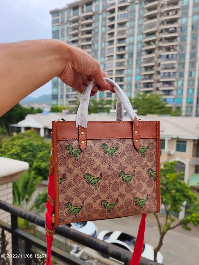 Coach t rex bag store