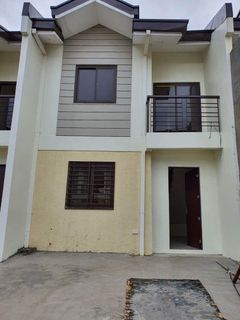 Newly turned over townhouse w 2 parking slots beside NU Calamba for rent