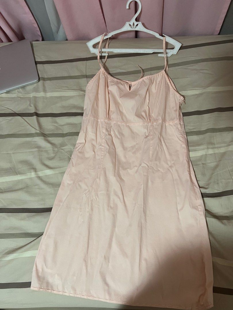 space knee length peach dress (Category: Dresses) located in Quezon City. Submitted by second___life (Listing ID 1212432045, Image 2). Description: space dress size L on tag but can fit m-l Fabric has some stretch A line fit Knee length Straps are adjustable loc: qc/ makati Shipping shouldered by buyer.