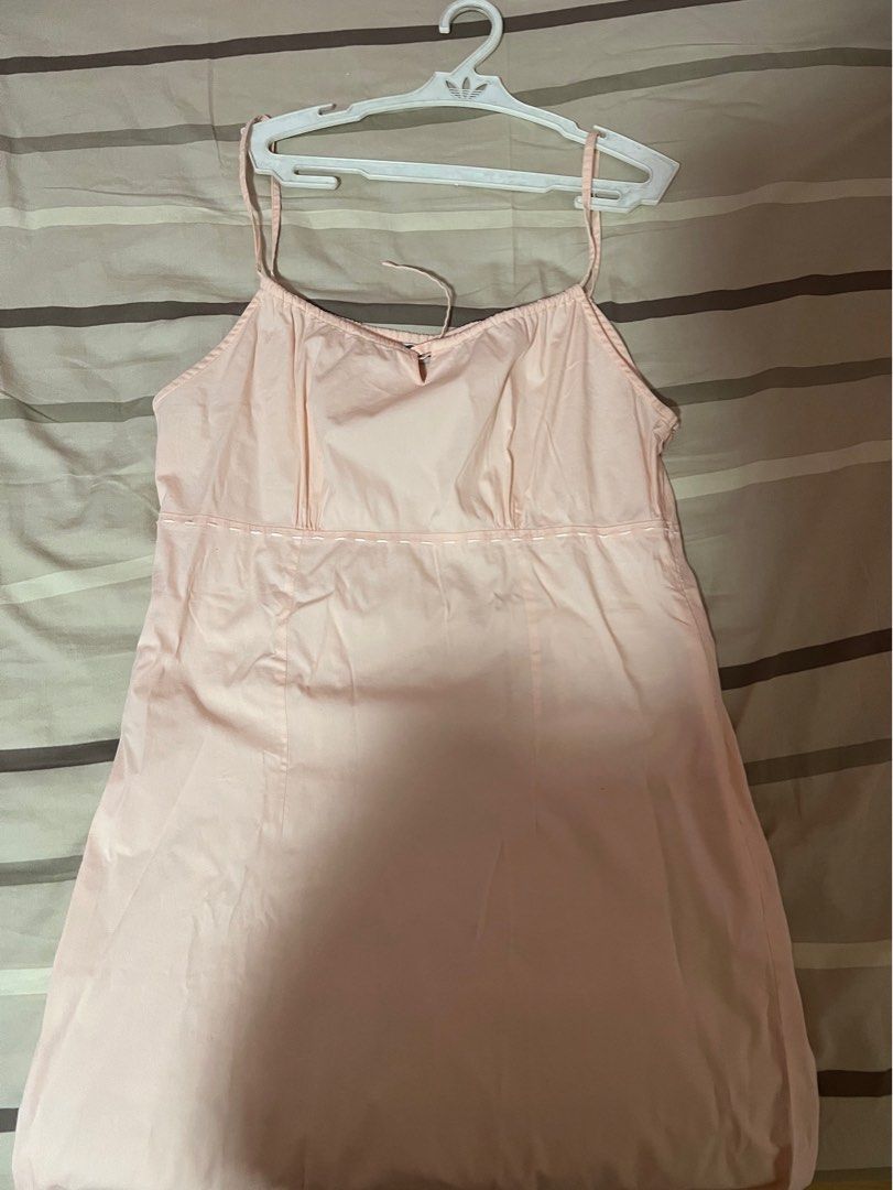 space knee length peach dress (Category: Dresses) located in Quezon City. Submitted by second___life (Listing ID 1212432045, Image 1). Description: space dress size L on tag but can fit m-l Fabric has some stretch A line fit Knee length Straps are adjustable loc: qc/ makati Shipping shouldered by buyer.