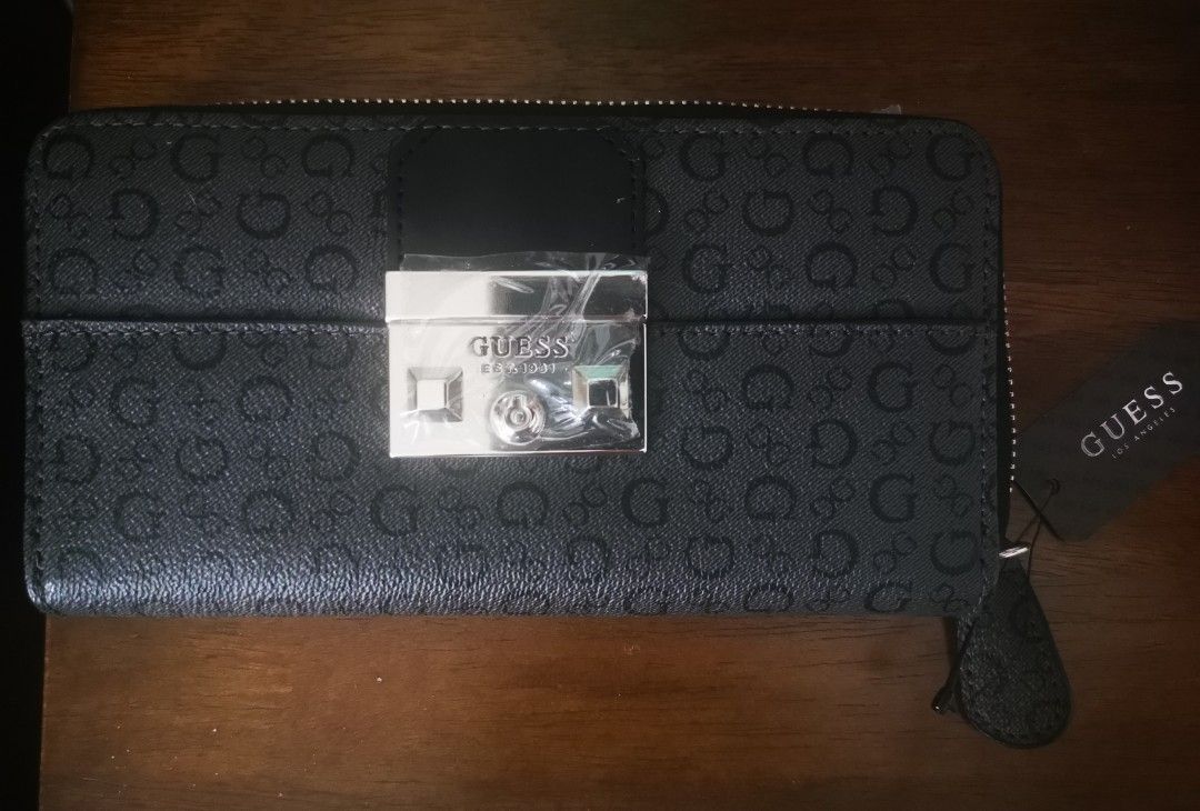 Guess Zip around women's wallet (Category: Wallets & Card holders) located in Quezon City. Submitted by frogprincess08 (Listing ID 1212487366, Image 1). Description: Authentic Guess Brand New zip around wallet. never used. only kept inside closet. in very good condition.