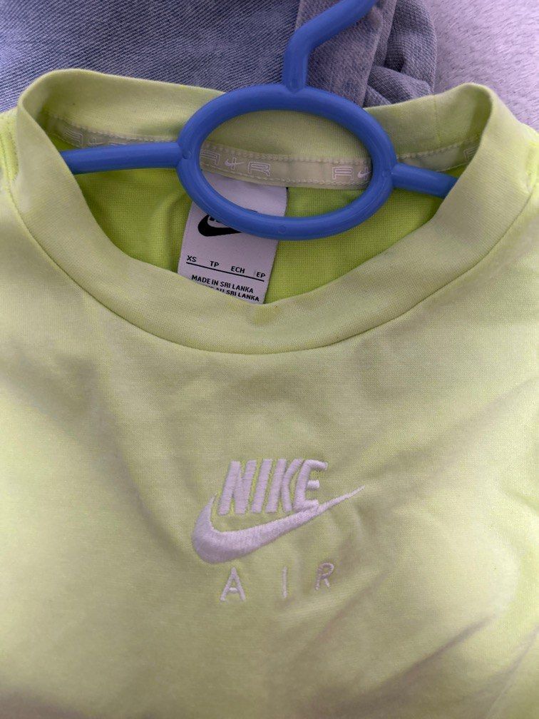 lime green and purple nike shirt