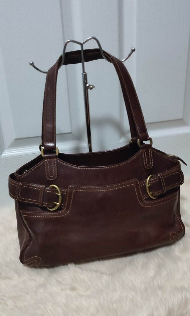 Nicole Miller brown leather bag (Category: Shoulder Bags) located in Cainta. Submitted by tobisshop.16 (Listing ID 1212592048, Image 1). Description: lightly used very good condition kapal ng leather.