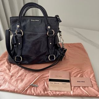 Buy Authentic, Preloved Miu Miu Vitello Lux Bow Satchel Grey Bags from  Second Edit by Style Theory