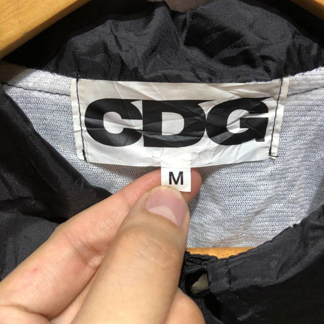 Cdg coach on sale jacket fake