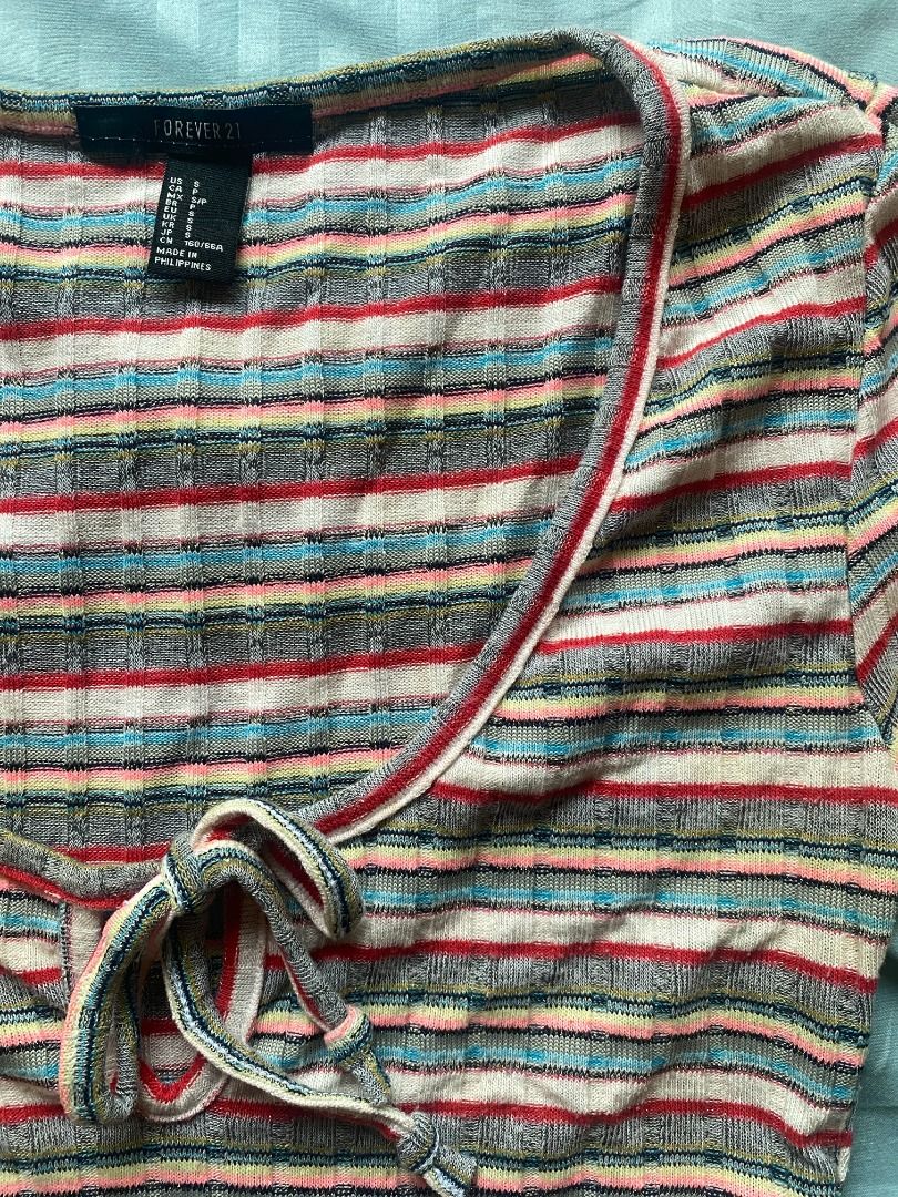 F21 striped ribbed shirt with lettuce hem (Category: Shirts) located in Pasig City. Submitted by hello__ivy (Listing ID 1207530281, Image 2). Description: Striped top from F21 Size S Stretchy ribbed material 🛵 Shipping via Grab or Lalamove (arranged by buyer) 📍 Cainta pick-up point 💵 MOP: Gcash / BDO / BPI.