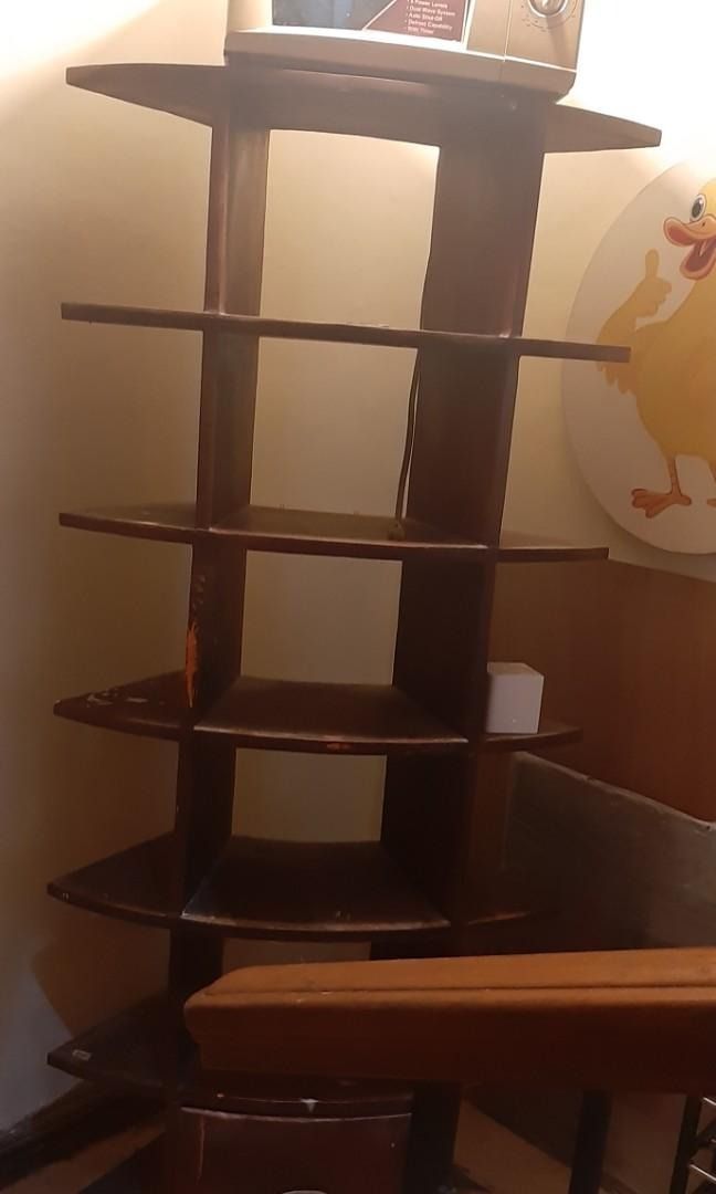 NARRA FURNITURE OPEN SHELF (Category: Shelves, Cabinets & Racks) located in Paranaque City. Submitted by sofiaflrs (Listing ID 1207443795, Image 2). Description: NARRA FURNITURE OPEN CURVED SHELF SEE DIMENSIONS ON THE LAST PICTURE PRICE IS NEGOTIABLE ❗ Color: Brown Material: Narra Condition: 8/10; Used; It hasn't been cleaned because there are still some stuff stored but will be cleaned once we find a legitimate buyer Problem: There's a splash of