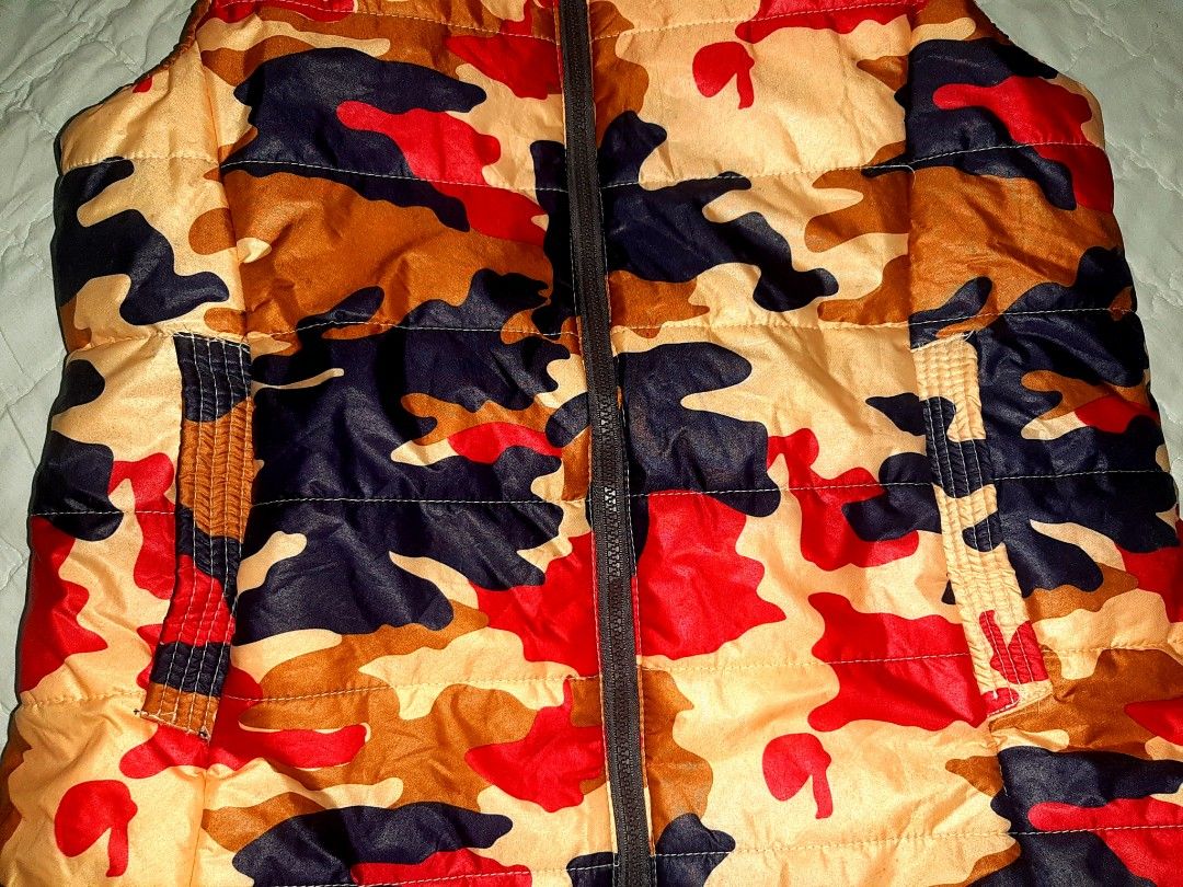 Red puffer jacket no sleeve clearance