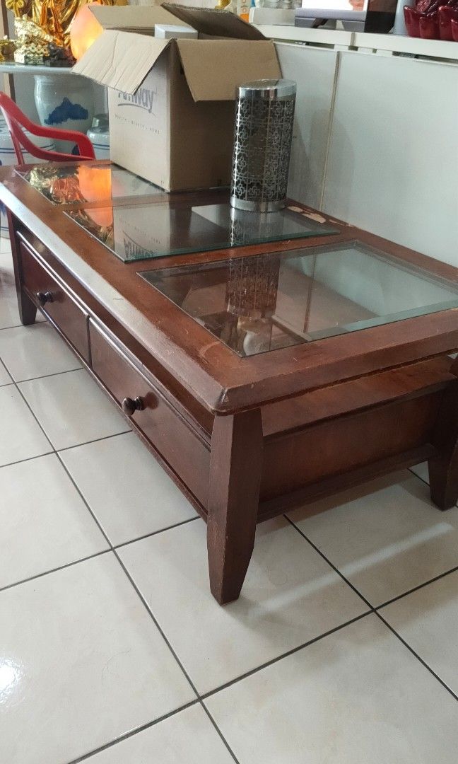 Solid wooden table (Category: Tables & Sets) located in Kuala Lumpur. Submitted by mytwinklestars_ (Listing ID 1207437422, Image 2). Description: around 130cm * 60cm * 50cm (height).