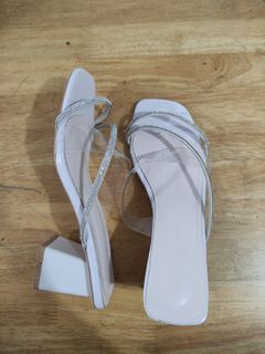 Transparent with glitter sandals. 2 inches blocked heels. Size 6.
