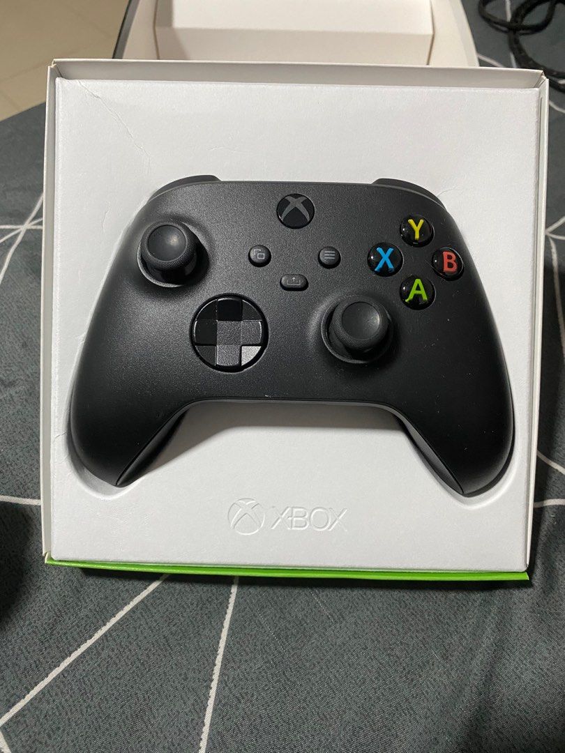 Xbox wireless controller (Category: Controllers) located in Singapore. Submitted by sharmadk (Listing ID 1207569980, Image 2). Description: Used it once or twice. Selling it with the box. Grab it while it lasts..