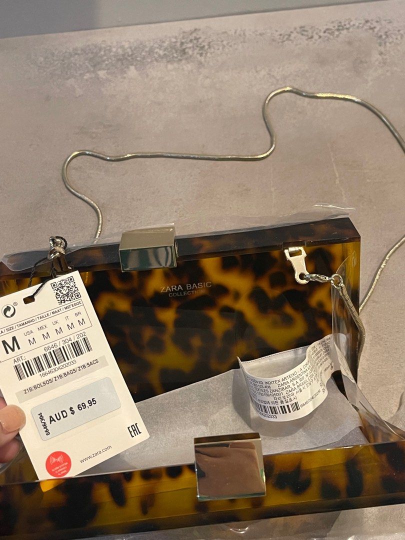 Zara tortoise clutch on sale