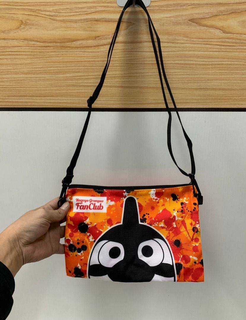 日本J League Nagoya Grampus 名古屋鯨魚Fan Club 限定橙色尼龍布斜咩袋, 兒童＆孕婦用品, 嬰兒及小童流行時尚-  Carousell