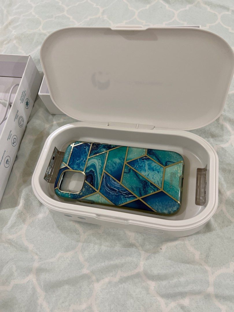 Before anything else ovi uv sterilizer box for cellphone (Category: Health Monitors & Weighing Scales) located in Pasig City. Submitted by everythingatsale (Listing ID 1207685397, Image 3). Description: Before anything else ovi uv sterilizer box for cellphone, you can sanitize your cellphone in this box.