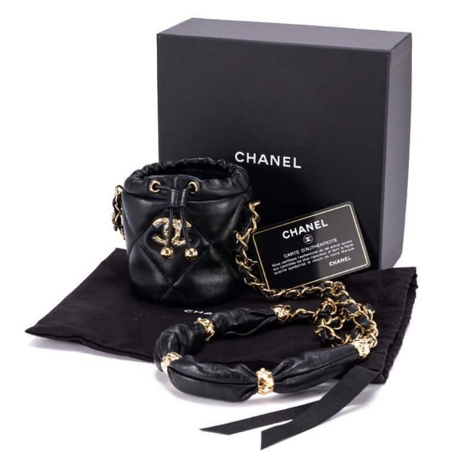 Authentic Vintage Chanel Black and Gold Calfskin shoulder bag