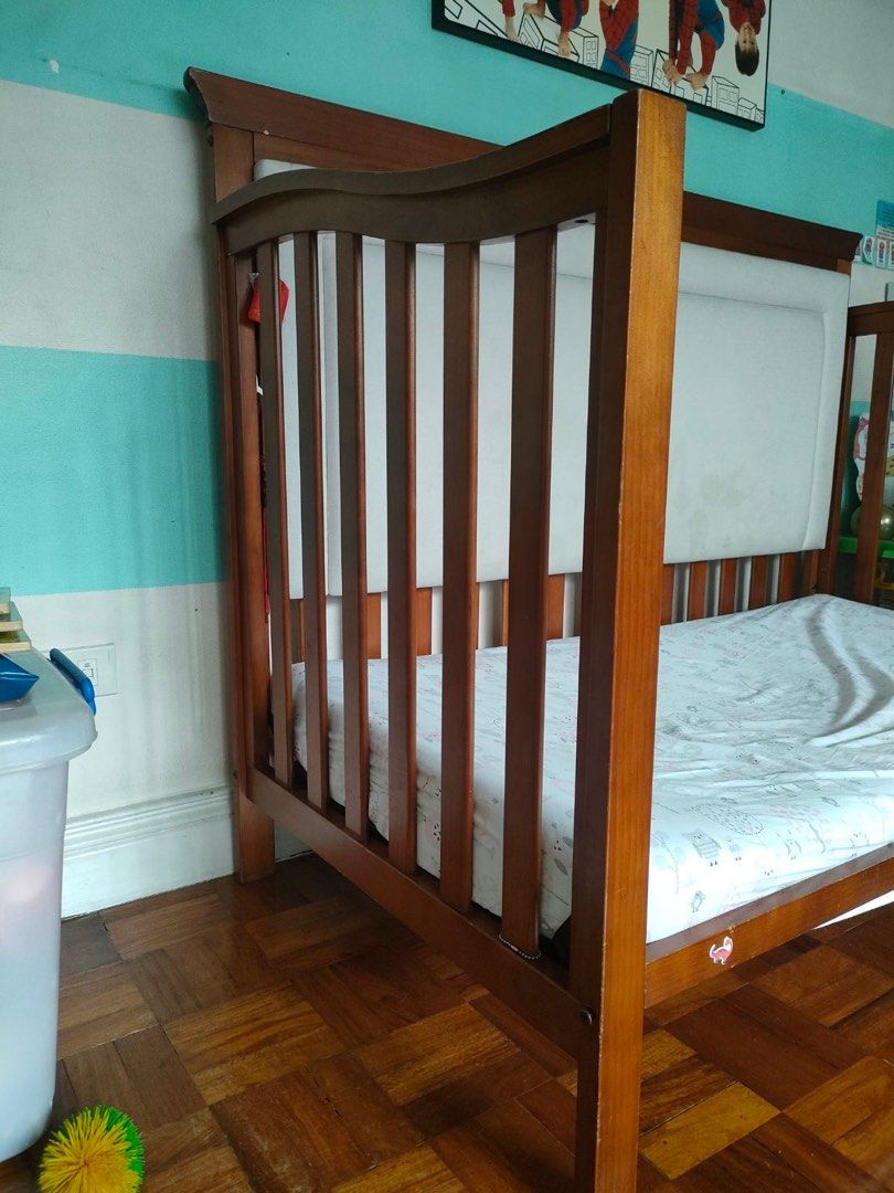 Cuddlebug Crib 4 in 1 (Category: Cots & Cribs) located in Quezon City. Submitted by ccbargains (Listing ID 1207712565, Image 2). Description: Repriced! Rush sale This is a very sturdy and beautiful crib from cuddlebug. The upholstery (foam) headboard (sideboard) was added to make it to look girly. It can be removed by unscrewing. Orig price is 18k Loc: qc timog Rfs: no need for it.
