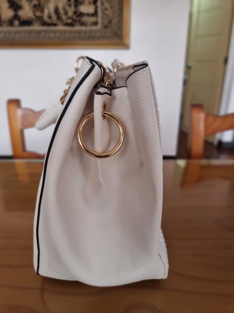 Marc New York (Category: Luxury Bags & Wallets) located in Dasmarinas. Submitted by ferrari800 (Listing ID 1207856555, Image 3). Description: Marc New York White with strap.