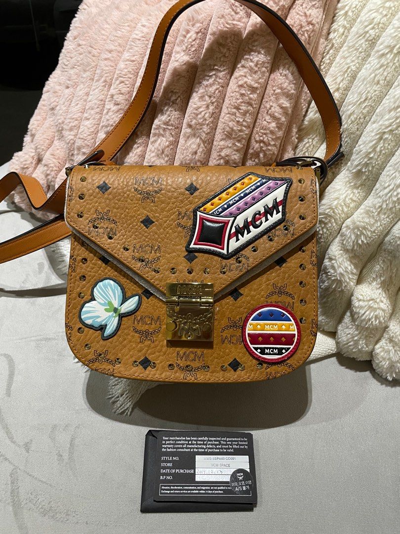 Mcm round crossbody hotsell bag