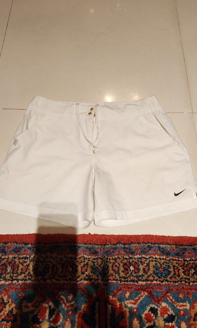 Nike white shorts women s fashion activewear on carousell