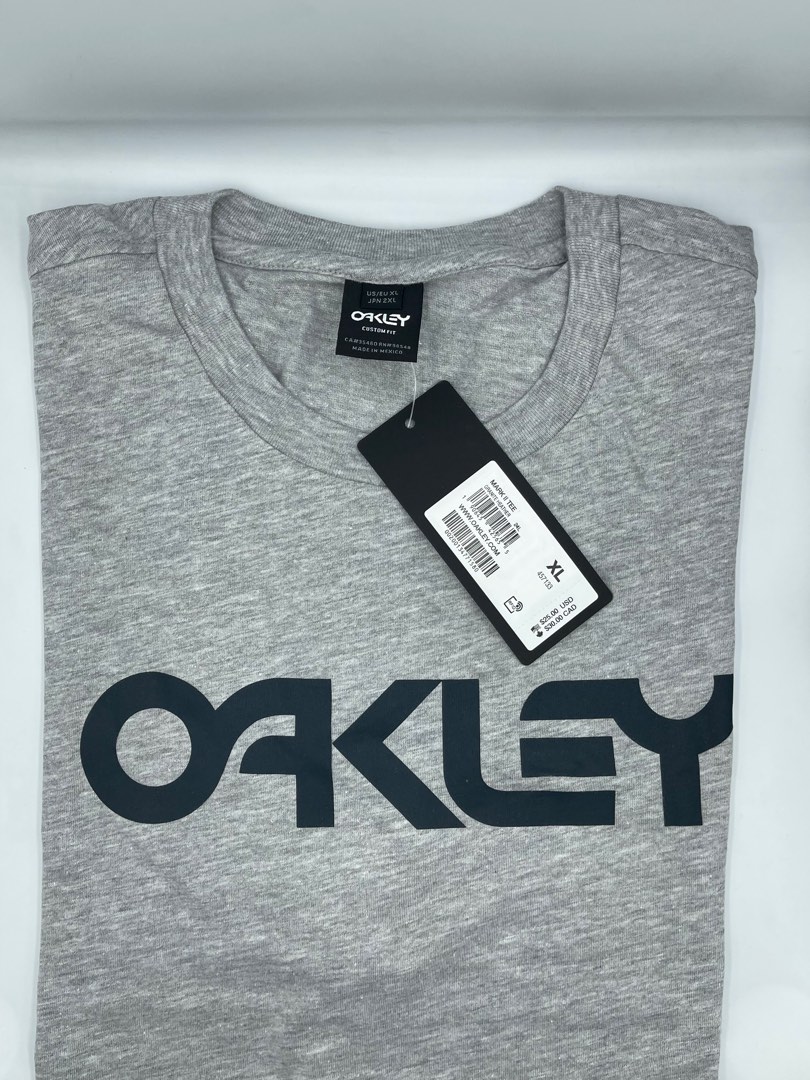Oakley shirt for men (XL only), Men's Fashion, Tops & Sets, Tshirts & Polo  Shirts on Carousell