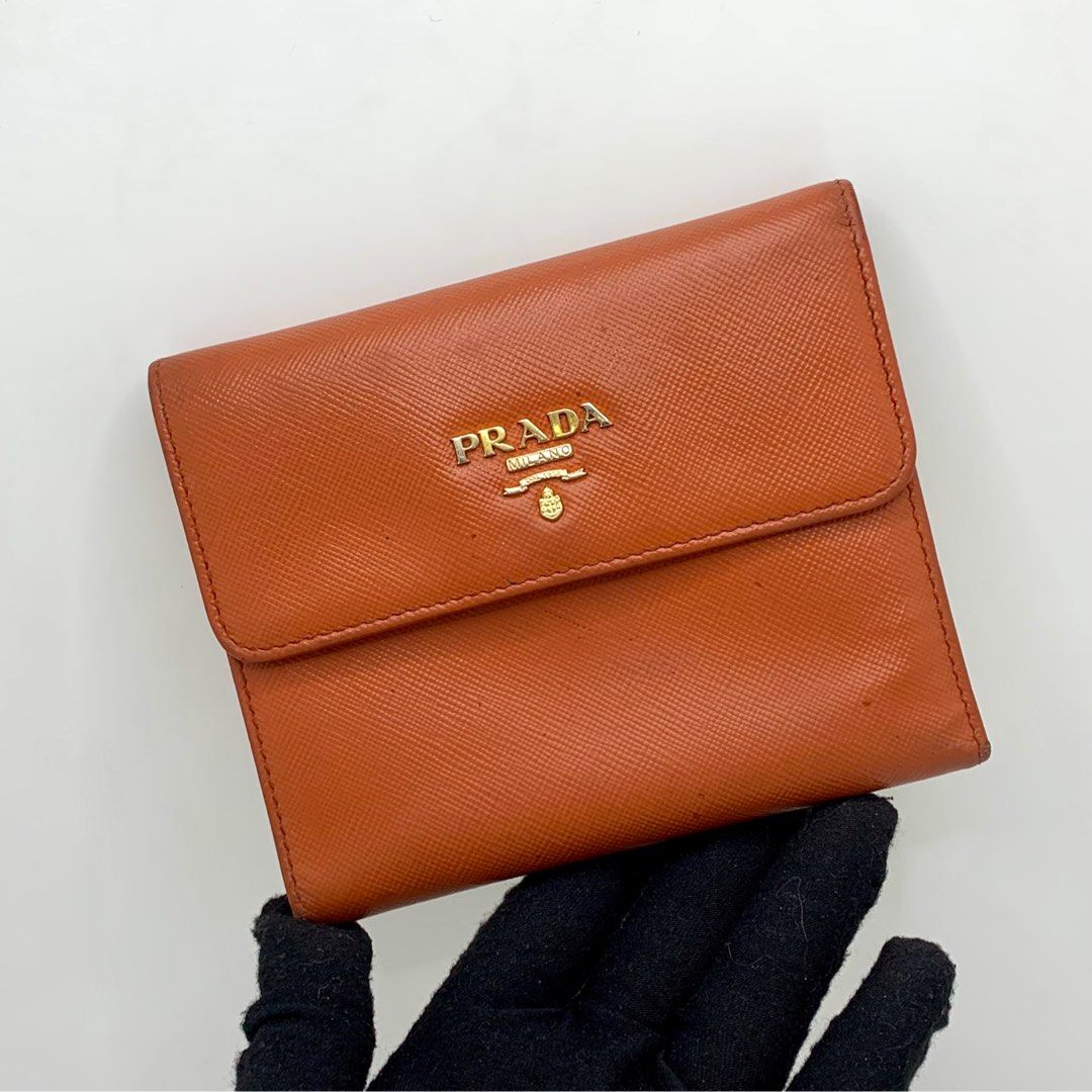 Prada wallet on chain saffiano leather, Women's Fashion, Bags & Wallets,  Purses & Pouches on Carousell