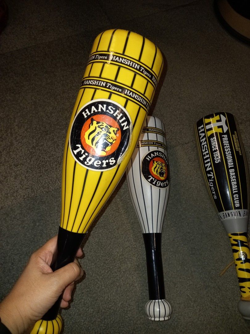 Hanshin Tiger fight plastic bat (Category: Action & Battle Toys) located in Pasig City. Submitted by nino_papa (Listing ID 1207932953, Image 3). Description: Hanshin Tiger fight bat collectible 3 designs available P500 per piece, Take All for P1,350. In good condition with slight flaw in stickers. MoP: GCash only Deliver via Lalamove or Grab, SF c/o buyer. Ok for meet up in SM MegaMall..