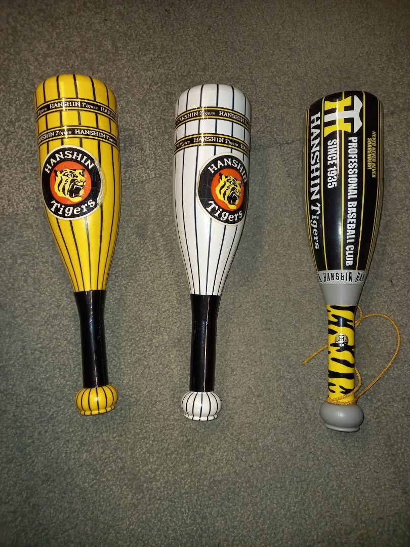 Hanshin Tiger fight plastic bat (Category: Action & Battle Toys) located in Pasig City. Submitted by nino_papa (Listing ID 1207932953, Image 2). Description: Hanshin Tiger fight bat collectible 3 designs available P500 per piece, Take All for P1,350. In good condition with slight flaw in stickers. MoP: GCash only Deliver via Lalamove or Grab, SF c/o buyer. Ok for meet up in SM MegaMall..
