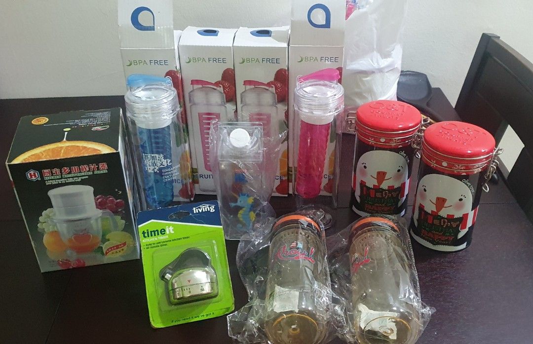 Misc stuff (Category: Water Bottles & Tumblers) located in Singapore. Submitted by alamaklynn (Listing ID 1207950772, Image 1). Description: Clearing stuff! 1) 2x Glass casserole with lid - $2 each! 2) Pink container with cover - $1 3) Cup - Sold! 4) 2 ways: Slice and Shred Peeler - $3 5) Magnets - $2 whole bag! 6) 4 x BPA free fruit juice water bottle (left 1 blue) - $2 each! 7) kitchen Multifunction Juicer - sold! 8) Milk water bottle - $2 9) T