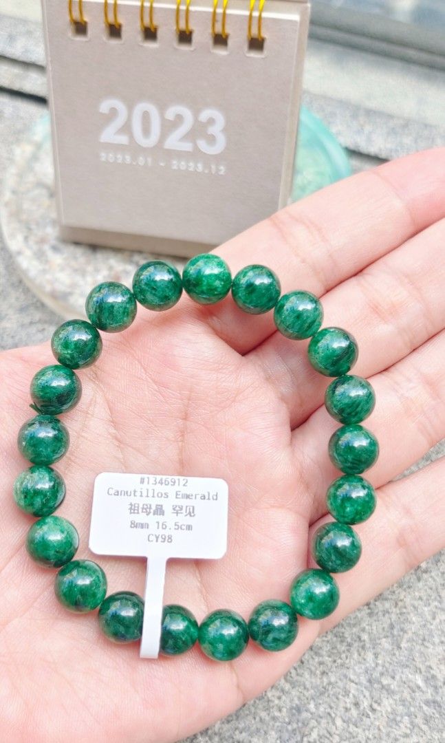 Oval Emerald stone and cz tennis bracelet 