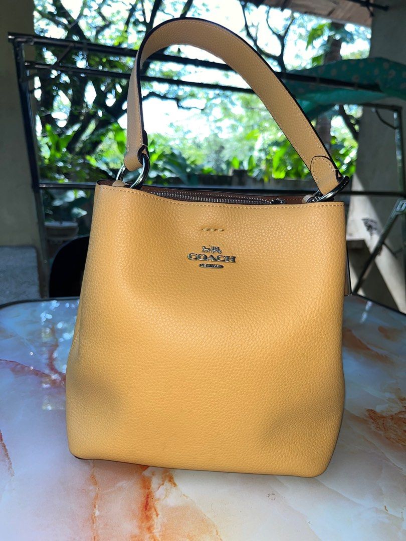 Coach small town bucket in honey comb, Luxury, Bags & Wallets on Carousell