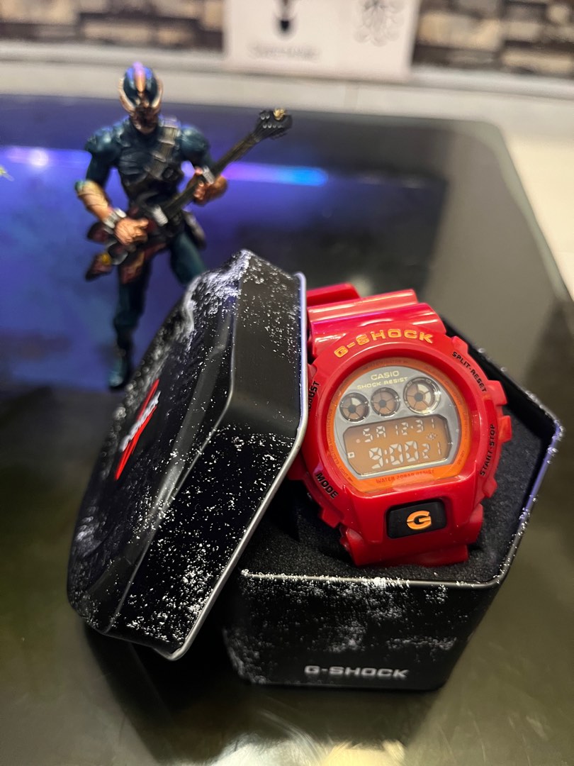 G store shock merah