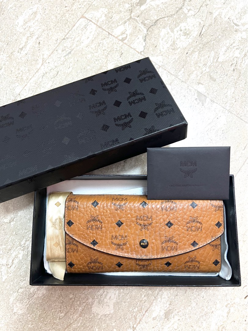 MCM trifold wallet in visetos original, Luxury, Bags & Wallets on Carousell