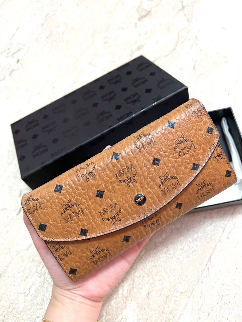 MCM trifold wallet in visetos original, Luxury, Bags & Wallets on Carousell
