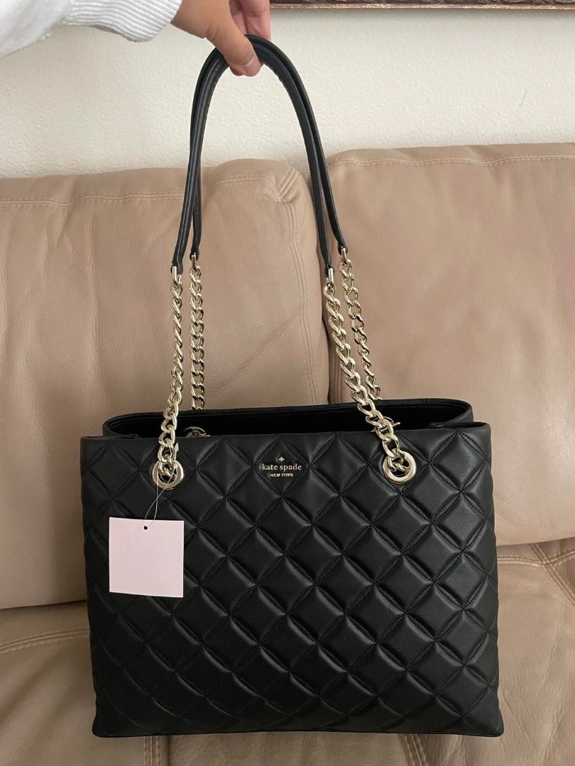 Kate Spade Natalia Large Tote Bag (Category: Luxury Bags & Wallets) located in Cavite. Submitted by stylisee.ph (Listing ID 1208198024, Image 1). Description: Brand New with Tag Bought in the US With minor flaws (dented bottom due to shipment) Measurements: - Bag: 9.8''h x 13.6''w x 5.1''d Material: - Black quilted leather with pale gold hardware Inclusions: Bag and care cards only MOP: GCash, Maya, BDO, or BPI (payment first before shipping) Shi