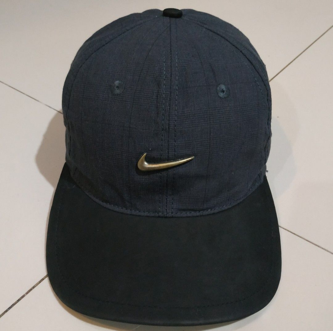 Topi golf nike best sale
