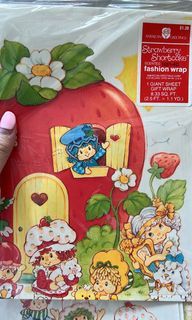 1980s strawberry shortcake / and herself the elf American greetings gift wrap