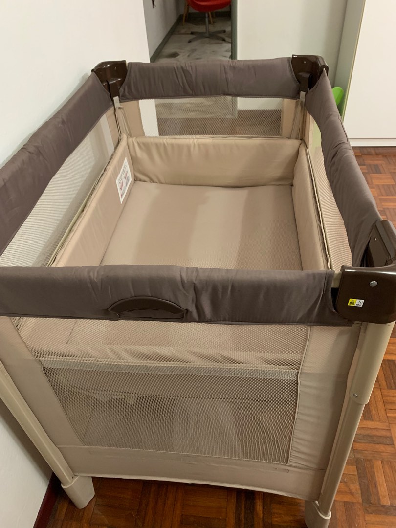 Aprica travel crib online
